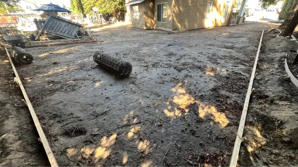 Excavated project area prepared for concrete forms and reinforcement